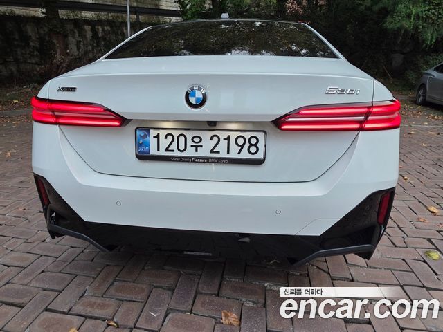 BMW 5-Series 2024 — photo 2