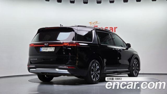 Kia Canival 2021 — photo 2