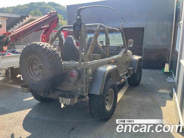 Jeep Wrangler 2001 — photo 2