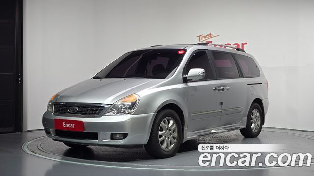 Kia Canival 2012 — photo 1