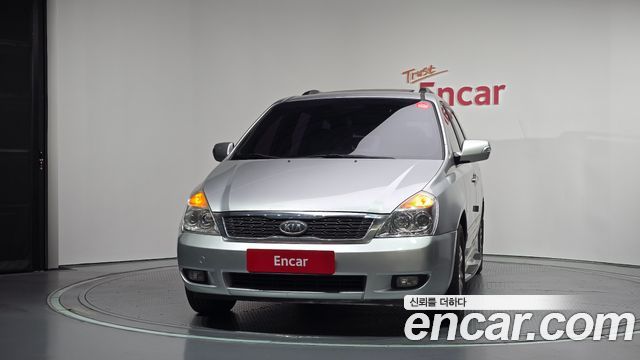 Kia Canival 2012 — photo 3