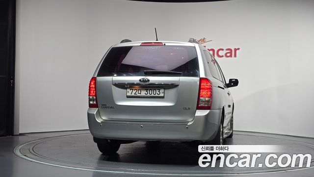 Kia Canival 2012 — photo 4