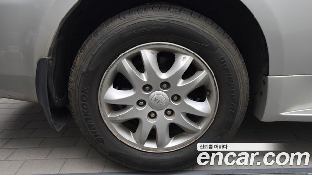 Kia Canival 2012 — photo 5