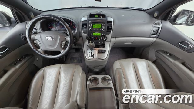 Kia Canival 2012 — photo 7
