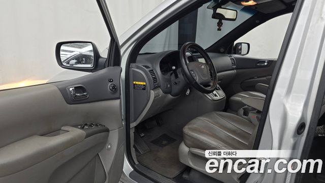 Kia Canival 2012 — photo 10