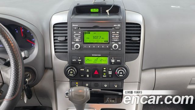 Kia Canival 2012 — photo 14