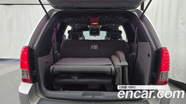 Kia Canival 2012 — photo 20