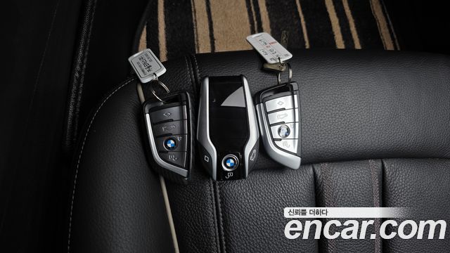 BMW 5-Series 2018 — photo 32