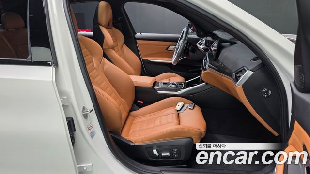 BMW 3-Series 2023 — photo 16