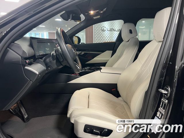 BMW 5-Series 2024 — photo 11