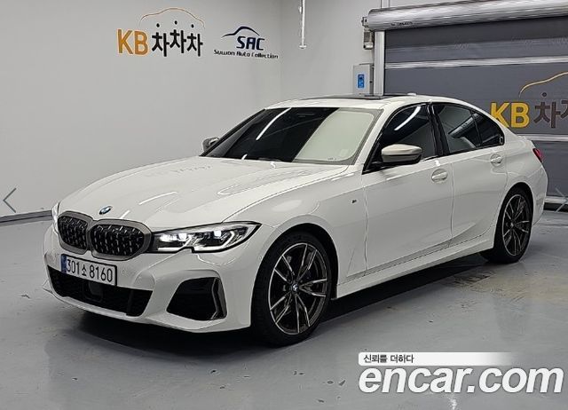 BMW 3-Series 2022 — photo 1