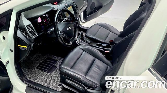 Kia K3 2013 — photo 9