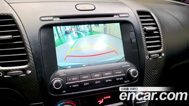 Kia K3 2013 — photo 12