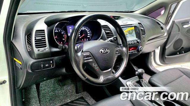 Kia K3 2013 — photo 16