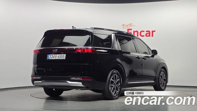 Kia Canival 2021 — photo 2
