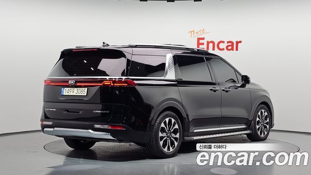 Kia Canival 2021 — photo 2