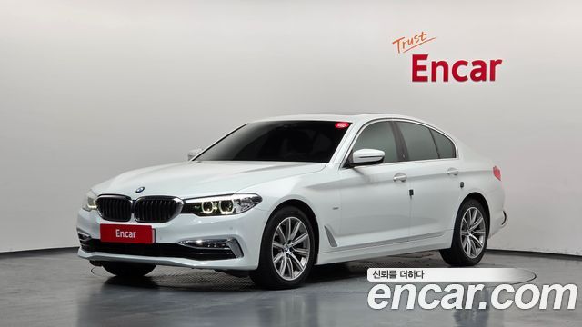 BMW 5-Series 2018 — photo 1