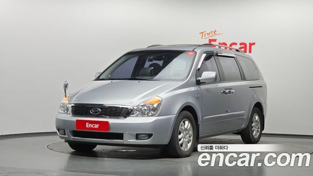 Kia Canival 2010 — photo 1