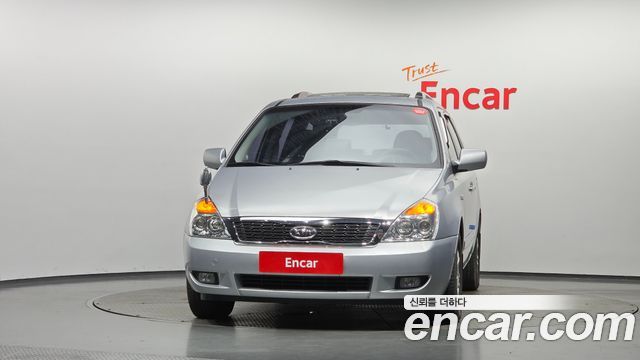 Kia Canival 2010 — photo 3