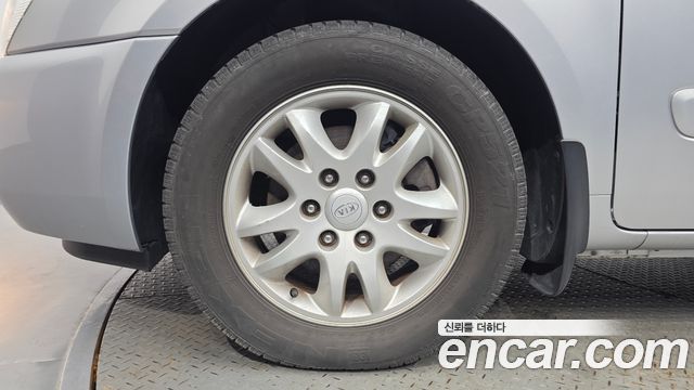 Kia Canival 2010 — photo 5