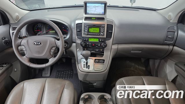 Kia Canival 2010 — photo 7