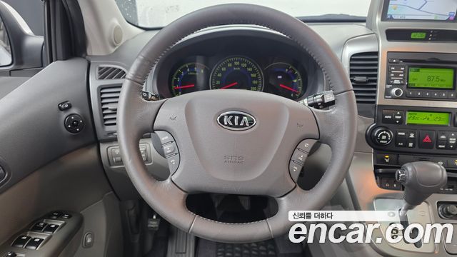 Kia Canival 2010 — photo 15