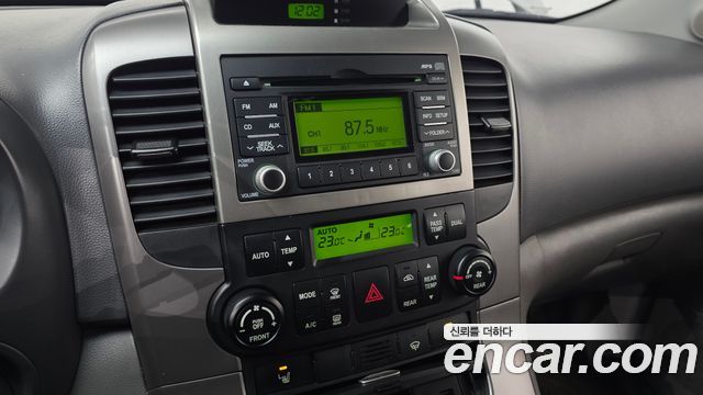 Kia Canival 2010 — photo 17