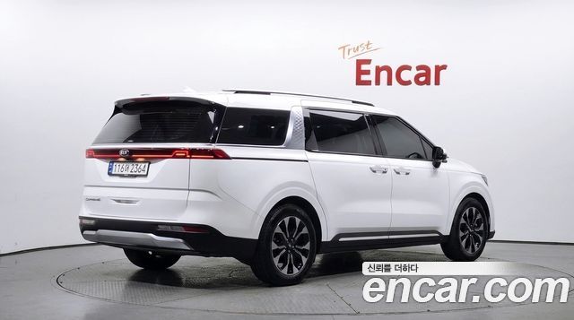 Kia Canival 2021 — photo 2