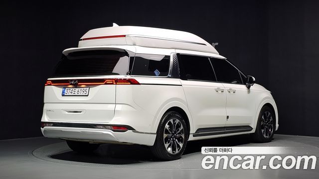 Kia Canival 2023 — photo 2