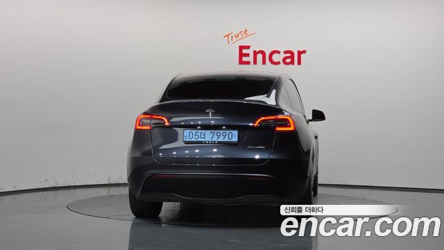 Tesla Model Y 2024 — photo 4