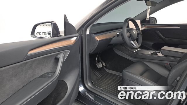 Tesla Model Y 2024 — photo 13
