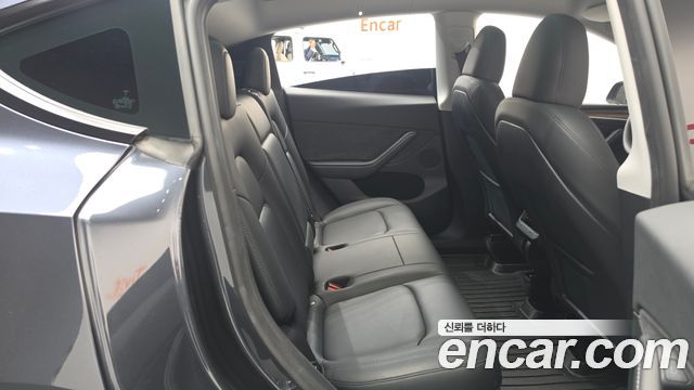 Tesla Model Y 2024 — photo 17