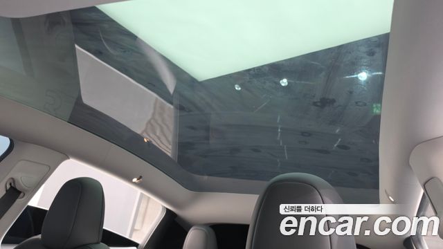 Tesla Model Y 2024 — photo 22