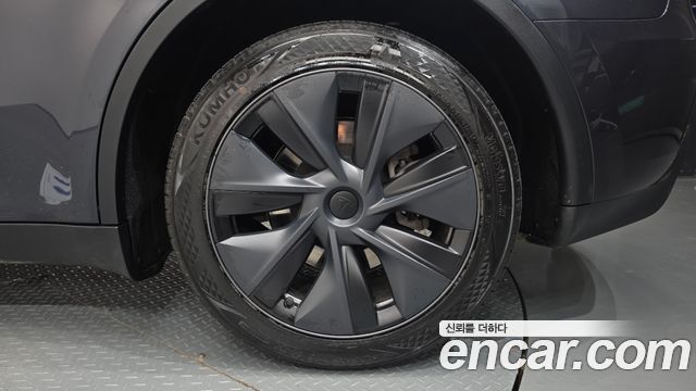 Tesla Model Y 2024 — photo 7