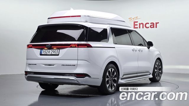 Kia Canival 2021 — photo 2