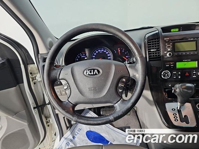 Kia Canival 2014 — photo 9
