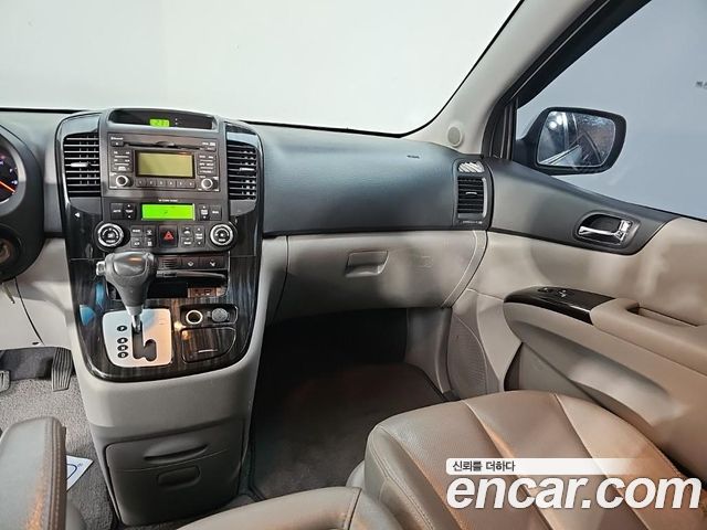 Kia Canival 2014 — photo 10