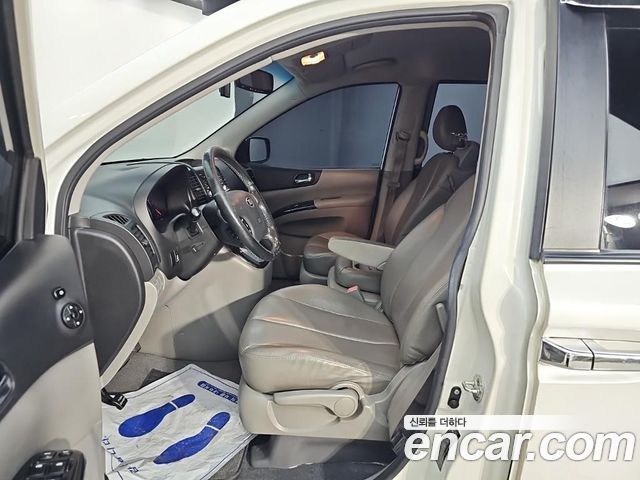 Kia Canival 2014 — photo 11