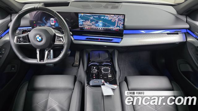 BMW 5-Series 2024 — photo 10