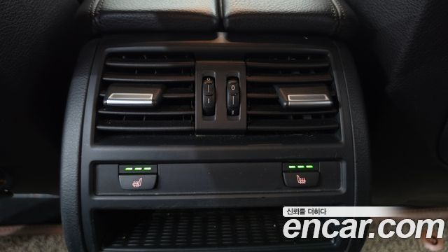 BMW 5-Series 2012 — photo 18