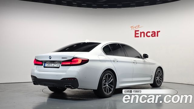 BMW 5-Series 2023 — photo 2