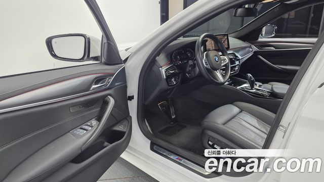 BMW 5-Series 2023 — photo 10