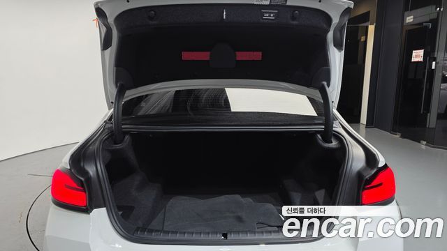 BMW 5-Series 2023 — photo 20