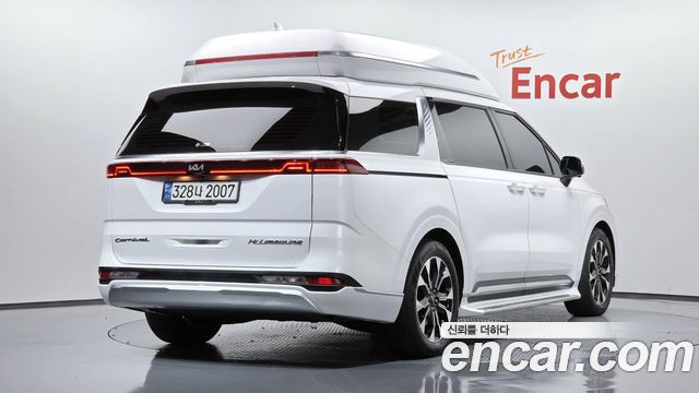 Kia Canival 2021 — photo 2