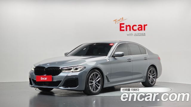 BMW 5-Series 2023 — photo 1