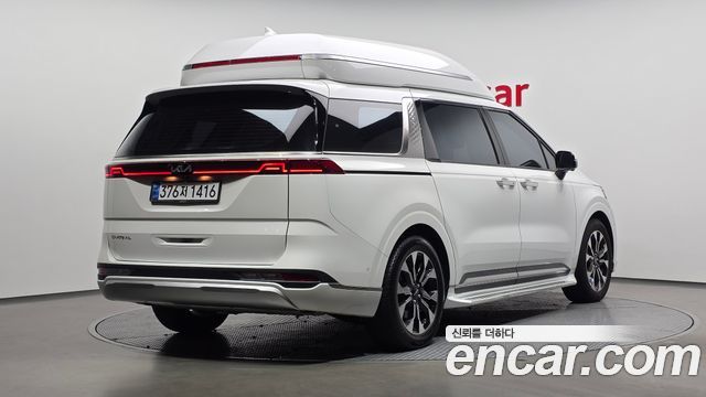 Kia Canival 2023 — photo 2