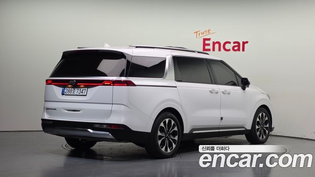 Kia Canival 2021 — photo 2