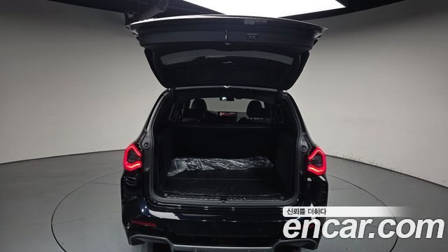 BMW iX3 2024 — photo 26