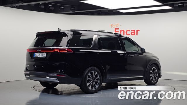 Kia Canival 2023 — photo 2