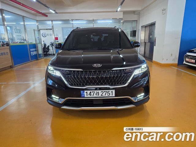 Kia Canival 2021 — photo 2